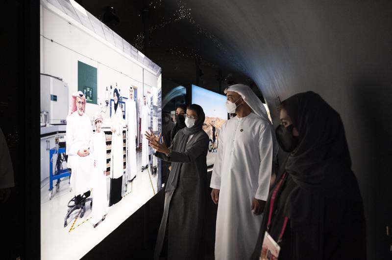 Noura Al Kaabi, Minister of Culture and Youth and Commissioner General of the UAE pavilion, presents displays at the UAE pavilion to Sheikh Mohamed bin Zayed, Crown Prince of Abu Dhabi and Deputy Supreme Commander of the Armed Forces, and Reem Al Hashimy, Minister of State for International Co-operation and Director General of Expo 2020 Dubai.