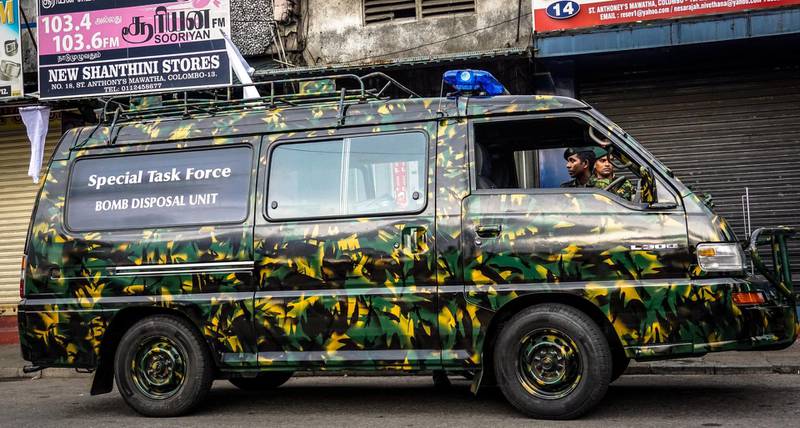 A bomb disposal unit van is seen at the site of a controlled explosion in Colombo, Sri Lanka, April 22, 2019. Jack Moore / The National. 