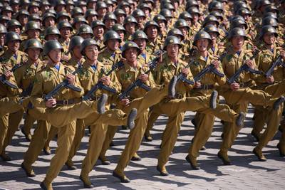 Korean People's Army (KPA) soldiers march during a mass rally on Kim Il Sung square in Pyongyang.  AFP