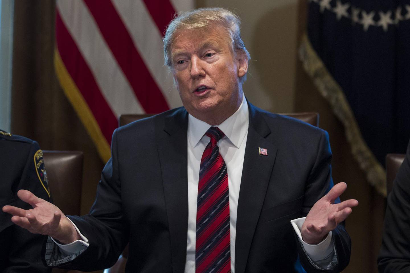 U.S. President Donald Trump speaks during a roundtable discussion on border security at the White House in Washington, D.C., U.S., on Friday, Jan. 11, 2019. The partial government shutdown stretched into its 21st day, tying the record for the longest. Judges, law enforcement officers, NASA engineers, weather forecasters and office staff were among some 800,000 federal workers who missed their first paychecks on Friday. Photographer: Zach Gibson/Bloomberg