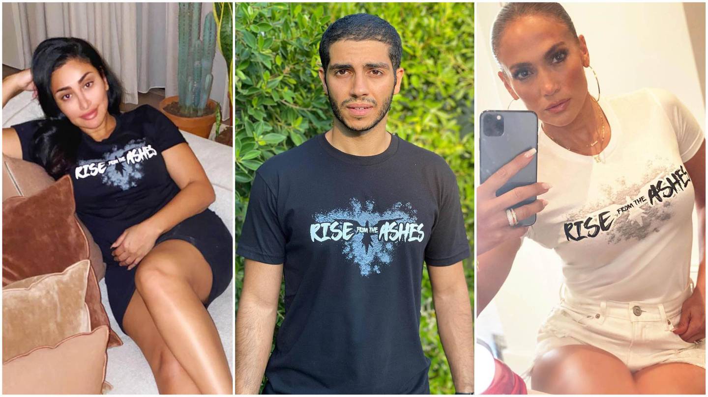 Huda Kattan, Mena Massoud and Jennifer Lopez have all worn Zuhair Murad's Rise from the Ashes T-shirt. Instagram 
