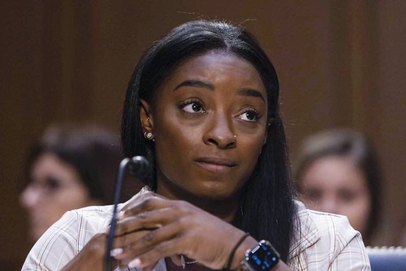Biles and dozens of other women sexually assaulted by Nassar are seeking more than $1 billion from the FBI for failing to stop the sports doctor after receiving reports against him. AP