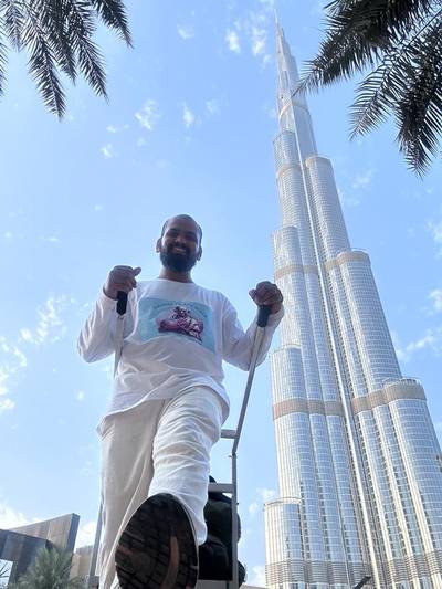 Mr Sonawane close to the Burj Khalifa. 