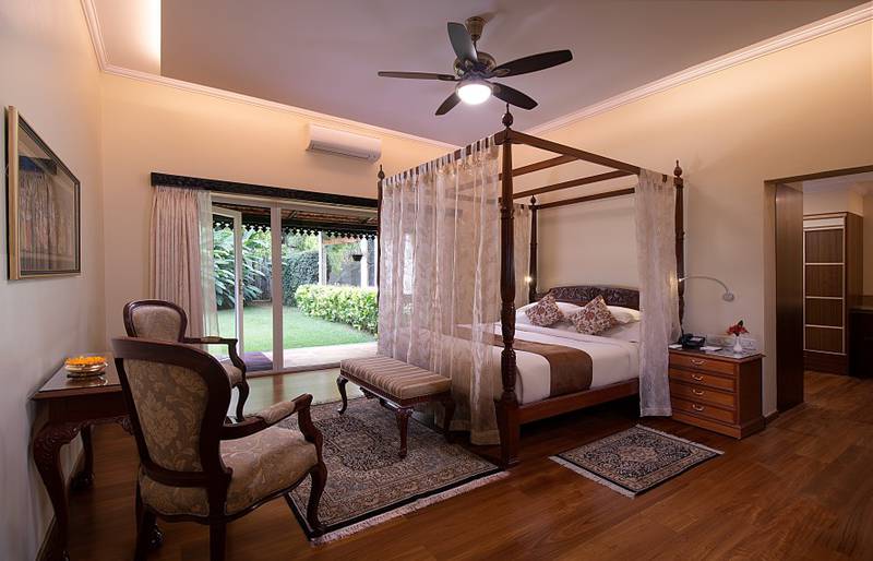 A four-poster bed in one of the retreat's 25 living spaces.