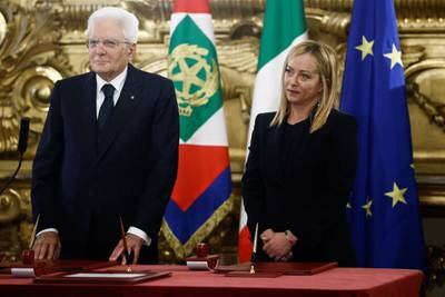 Ms Meloni and Italian President Sergio Mattarella during the  ceremony, at the Quirinale Presidential Palace. Reuters
