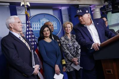 U.S. President Donald Trump, right, looks at U.S. President Mike Pence while answering a question during a news conference in the briefing room of the White House in Washington, D.C., U.S., on Saturday, March 14, 2020. Trump said he took a test to determine whether he has coronavirus, days after learning that he’s come in contact with people who were infected or are concerned they’ve got the virus. Photographer: Shawn Thew/EPA/Bloomberg