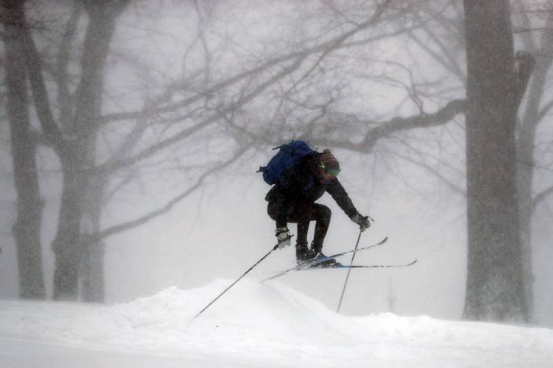 A skier launches from a ramp in Boston Common, Boston.  AP