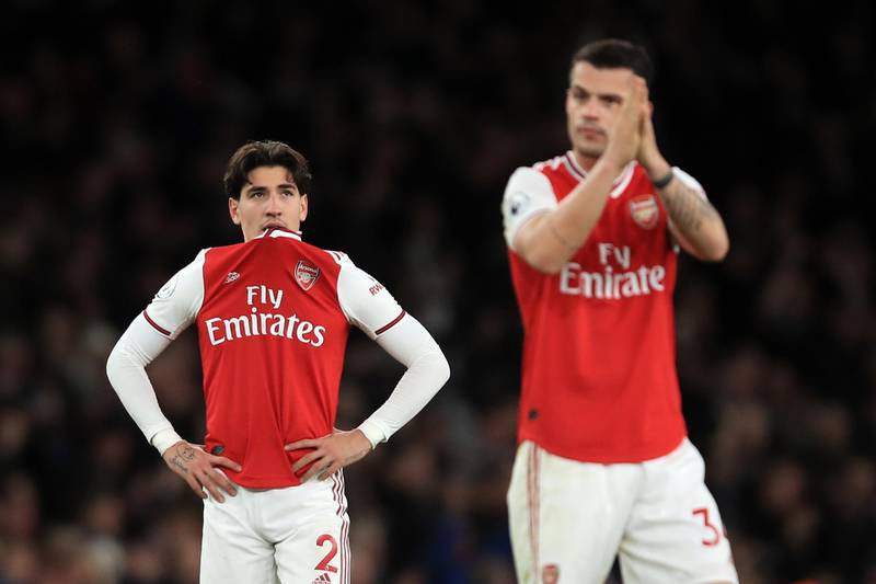 LONDON, ENGLAND - DECEMBER 05: A dejected Hector Bellerin and Granit Xhaka of Arsenal during the Premier League match between Arsenal FC and Brighton & Hove Albion at Emirates Stadium on December 5, 2019 in London, United Kingdom. (Photo by Marc Atkins/Getty Images)