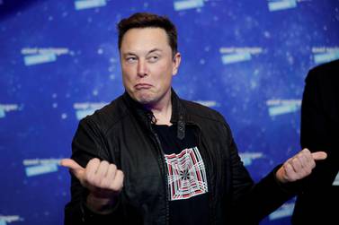 Tesla's billionaire CEO Elon Musk after arriving on the red carpet for the Axel Springer award, in Berlin this month. Mr Musk said he was rebuffed by Apple's CEO when he tried to hold talks with him about Apple possibly buying the company when it faced production problems related to its Model 3 sedan. Reuters
