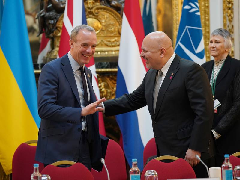 UK Deputy Prime Minister and Justice Secretary Dominic Raab, left, greets the ICC's chief prosecutor Karim Khan at Lancaster House in London. Photo: Yui Mok