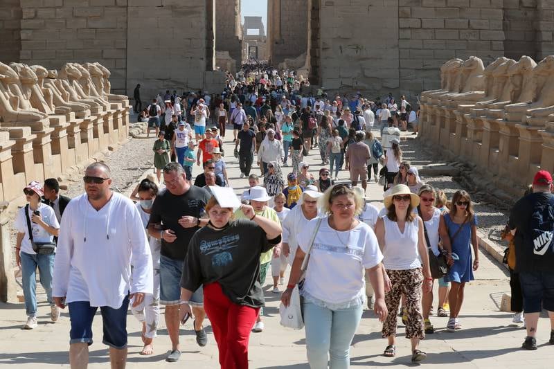 Tourists visit the Karnak Temple complex. All photos: EPA