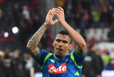 FILE - In this Thursday, March 14, 2019 file photo, Napoli's Allan leaves at the end of the Europa League round of 16 second leg soccer match between FC Salzburg and Napoli in the Arena stadium in Salzburg, Austria. Brazil midfielder Allan has reunited with Carlo Ancelotti after moving from Napoli to Everton. The transfer fee was not disclosed by the two clubs but media reports estimated it at $27.8 million. The 29-year-old Allan played 61 games under Ancelotti when the Everton coach was in charge at Napoli.  (AP Photo/Kerstin Joensson, File)