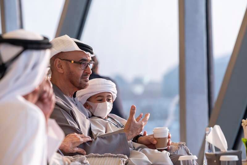 President Sheikh Mohamed and his grandson, Sheikh Zayed bin Theyab. Photo: Ryan Carter / UAE Presidential Court