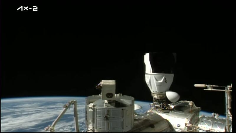 The Dragon capsule docks at the ISS