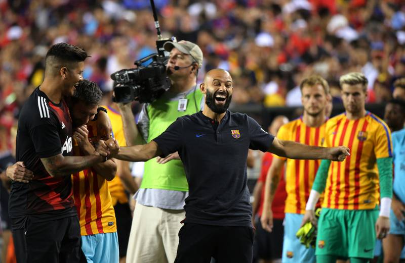 Barcelona's Javier Mascherano celebrates after the match. Carlos Barria / Reuters