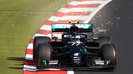 Eifel Grand Prix: Valtteri Bottas pips Lewis Hamilton to pole