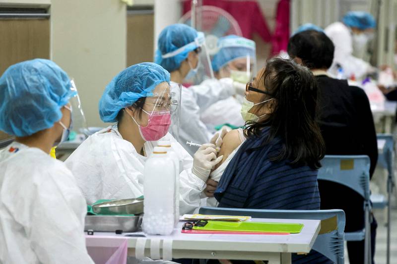 A woman receives a booster shot in Taipei, Taiwan. Reuters