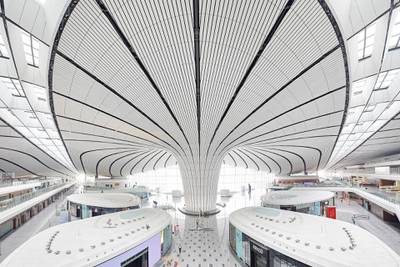 Zaha Hadid designed the airport the gather people around a central terrace. Courtesy Hufton+Crow