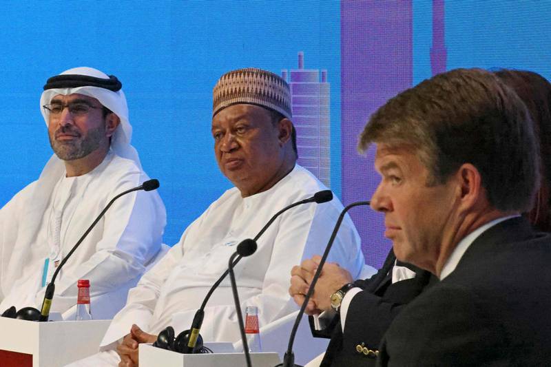 Suhail Al Mazrouei, the UAE's Minister of Energy and Infrastructure, with Opec Secretary General Mohammad Barkindo, centre, at the Atlantic Council's Global Energy Forum in Dubai. AFP
