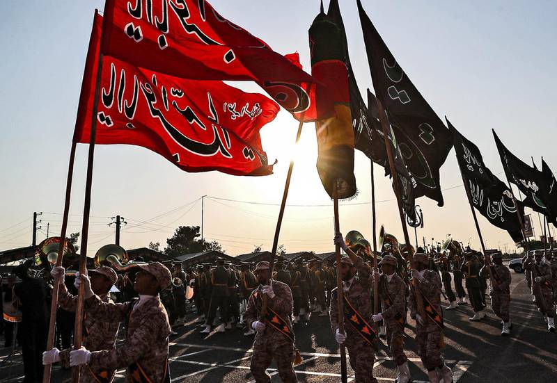 A handout picture provided by the Iranian presidency on September 22, 2019 shows Members of Iran's Islamic Revolutionary Guard Corps (IRGC) marching during the annual "Sacred Defence Week" military parade marking the anniversary of the outbreak of the devastating 1980-1988 war with Saddam Hussein's Iraq, in the capital Tehran. - Rouhani said on September 22 that the presence of foreign forces creates "insecurity" in the Gulf, after the US ordered the deployment of more troops to the region. "Foreign forces can cause problems and insecurity for our people and for our region," Rouhani said in a televised speech at the annual military parade, adding that Iran would present to the UN a regional cooperation plan for peace. (Photo by - / Iranian Presidency / AFP) / === RESTRICTED TO EDITORIAL USE - MANDATORY CREDIT "AFP PHOTO / HO / IRANIAN PRESIDENCY" - NO MARKETING NO ADVERTISING CAMPAIGNS - DISTRIBUTED AS A SERVICE TO CLIENTS ===