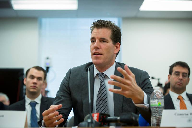 FILE PHOTO: Cameron Winklevoss speaks at a New York State Department of Financial Services (DFS) virtual currency hearing in the Manhattan borough of New York, U.S., January 28, 2014.   REUTERS/Lucas Jackson/File Photo