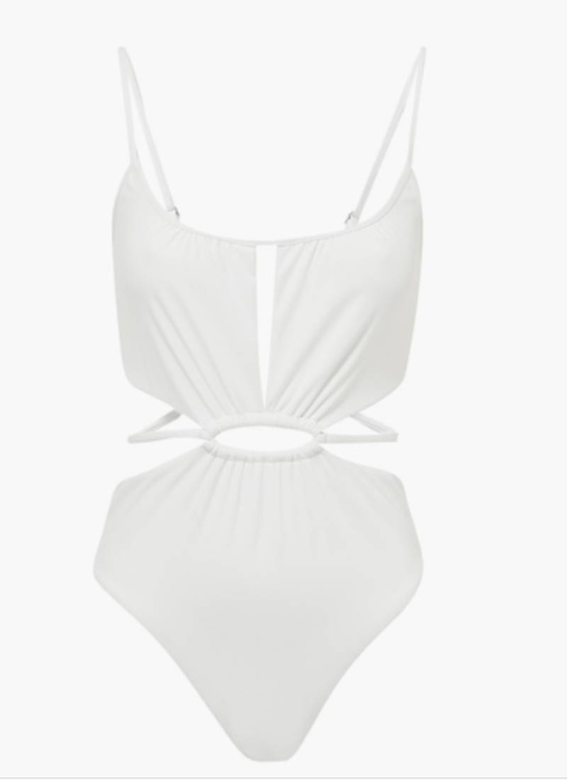 Cut-out swimsuits: the white Jonathan Simkhai Genesis cut-out swimsuit brings a plethora of details to this classic one-piece, with spaghetti straps, ruching, cut-outs and a midsection belt, all combining to make it a key piece for summer; Dh606,  Jonathan Simkhai at bloomingdales.ae. Photo: Bloomingdales