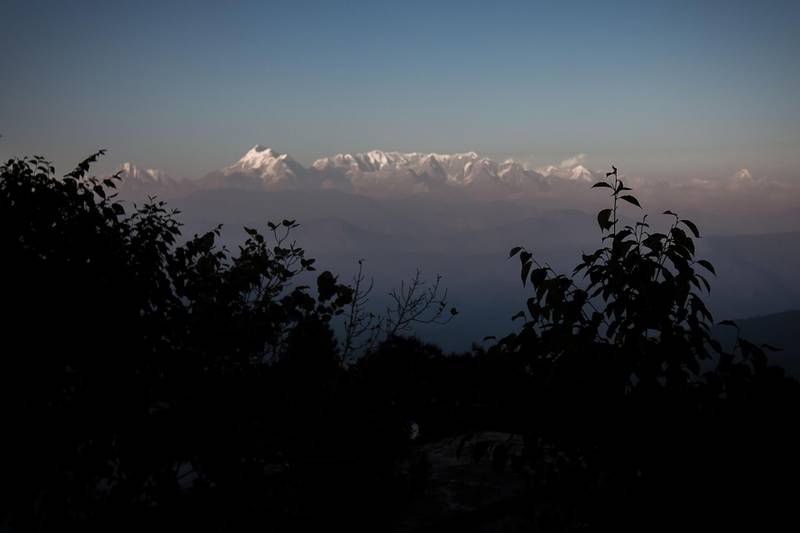 (FILES) This file photo taken on November 13, 2015, shows a general view of the Himalayas from the hill-station of Kausani in the northern Indian state of Uttarakhand.  Scores of emergency workers were battling bad weather Saturday to locate eight climbers missing on India's second highest mountain, an official said. Four Britons, two Americans, an Australian and an Indian were set to climb the 7,826-metre (25,643-foot) Nanda Devi East peak -- near the border with China -- and return to the base camp last weekend.

 / AFP / Agnes BUN
