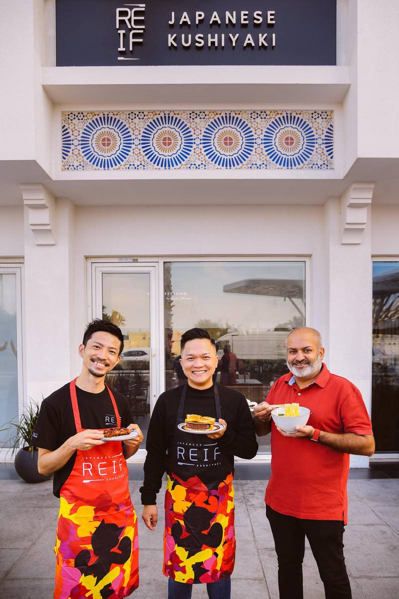Chef Reif Othman, centre, with chef Jun Tomioka, left, and business partner Ahsan Kahlon. Courtesy Reif Japanese Kushiyaki
