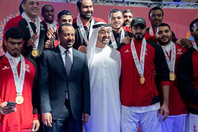 ABU DHABI, UNITED ARAB EMIRATES - March 20, 2019: HH Sheikh Mohamed bin Zayed Al Nahyan, Crown Prince of Abu Dhabi and Deputy Supreme Commander of the UAE Armed Forces (3rd L) with HE Abiy Ahmed, Prime Minister of Ethiopia (2nd L) stand for a photograph with Special Olympics World Games Abu Dhabi 2019 athletes at Abu Dhabi National Exhibition Centre. 

( Mohamed Al Hammadi / Ministry of Presidential Affairs )
---