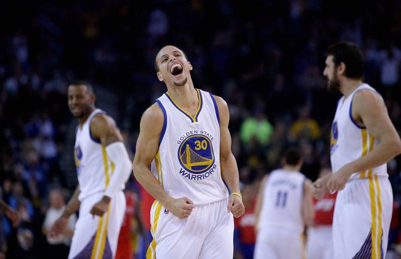 Stephen Curry of the Golden State Warriors reacts during their win over the Houston Rockets in the NBA on Tuesday night. Ezra Shaw / Getty Images / AFP / January 21, 2015