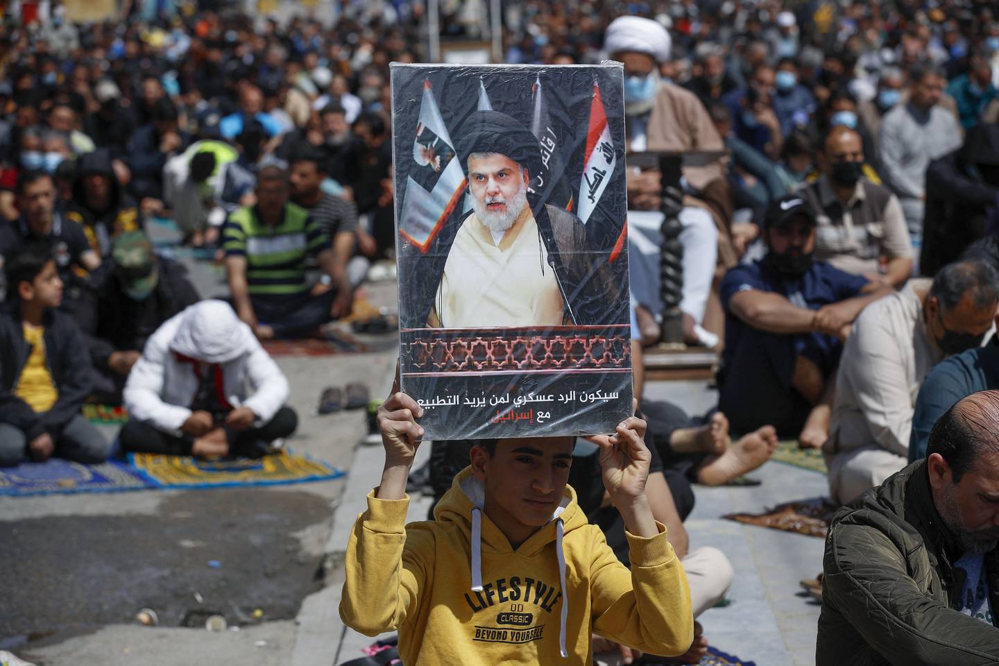 A supporter of Iraqi Shiite cleric Muqtada Al Sadr in Sadr City, east of the capital Baghdad, on March 25. AFP