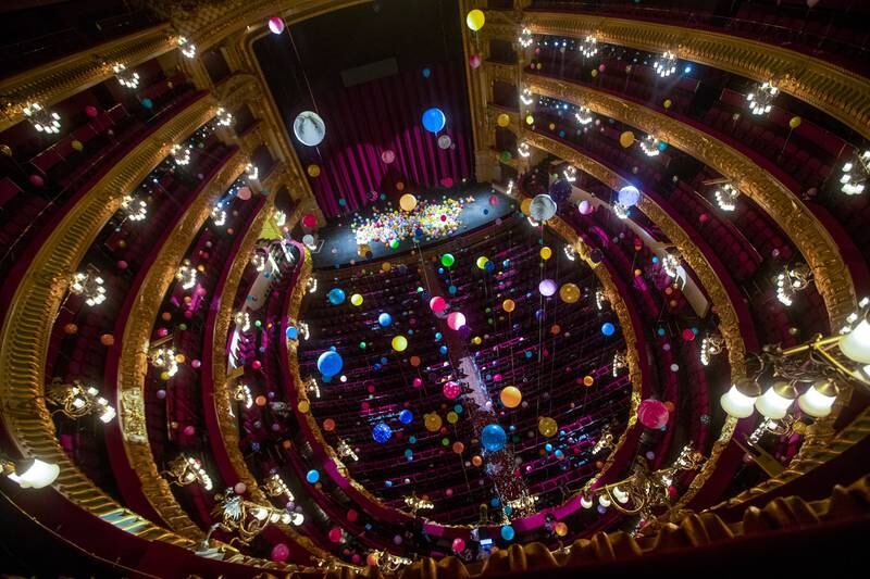 The auditorium of the Liceu Theatre is decorated with colorful balloons during a presentation of Brazilian artist Flavia Junqueira's installation in Barcelona, Spain. EPA