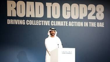Abdulla Bin Touq, Minister of Economy, speaks during a Road to Cop28 event held in Dubai this week. Pawan Singh / The National