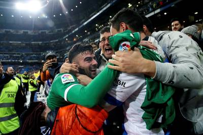 epa06471887 Leganes Diego Rico (L) celebrates the victory after the King's Cup quarter-final second leg match between Real Madrid and Leganes at the Santiago Bernabeu stadium in Madrid, Spain, 24 January 2018.  EPA/Juanjo Martin