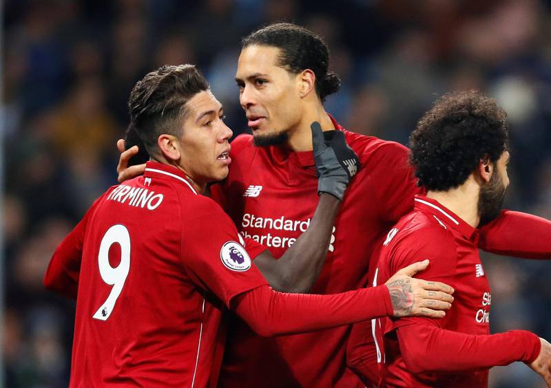 Centre-back: Virgil van Dijk (Liverpool) – Began the festive period with a well-taken goal at Wolves. Defended superbly in all four games and subdued Pierre-Emerick Aubameyang. Action Images via Reuters/Jason Cairnduff