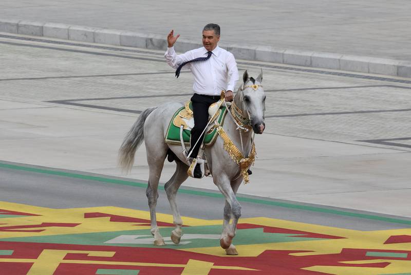 Turkmen President Gurbanguly Berdimuhamedov rides a horse at a parade marking the Independence Day in Ashgabat, Turkmenistan September 27, 2021.  REUTERS / Vyacheslav Sarkisyan