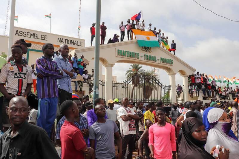 Protesters at the entrance to the National Assembly during a rally in Niamey, Niger on Thursday. EPA