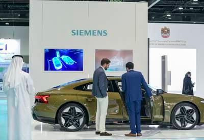 The Siemens stand at the Electric Vehicle Innovation Summit at Abu Dhabi National Exhibition Centre. All pictures by Khushnum Bhandari / The National
