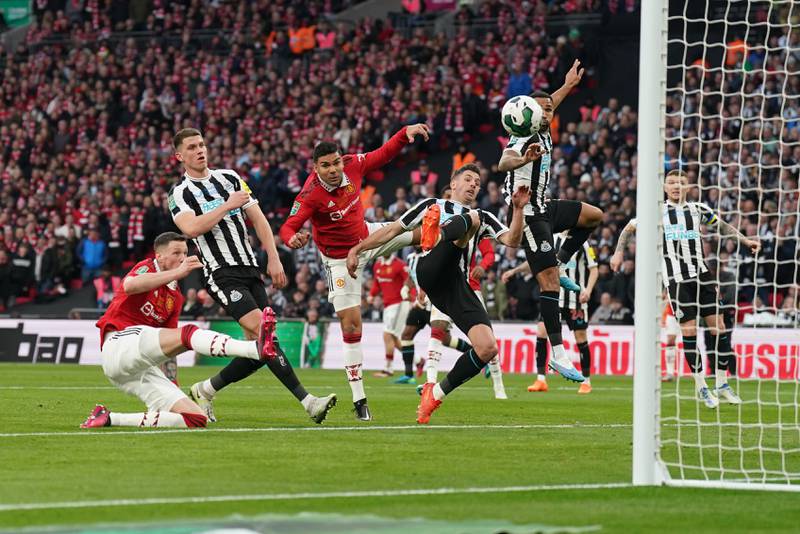 Manchester United's Casemiro scores their first goal against Newcastle United in the League Cup final at Wembley Stadium on Sunday, February 26, 2023. PA
