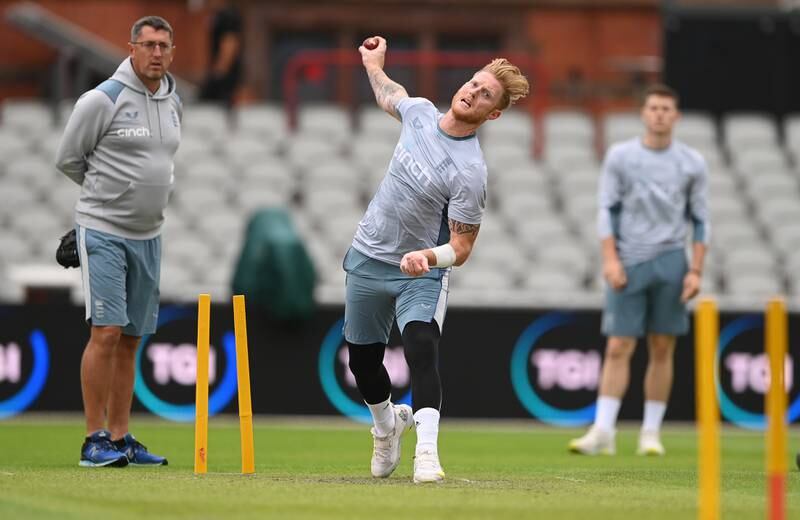 England captain Ben Stokes during training as bowling coach Jon Lewis and Matthew Potts look on. Getty