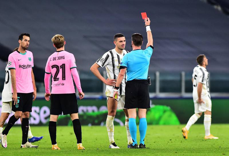 Juventus’ Merih Demiral is shown a red card by referee Danny Makkelie. Reuters