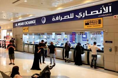 Dubai, United Arab Emirates-September 14, 2012;   Customers at the  Al Ansari  Exchange  in Dubai  . (  Satish Kumar / The National ) For News