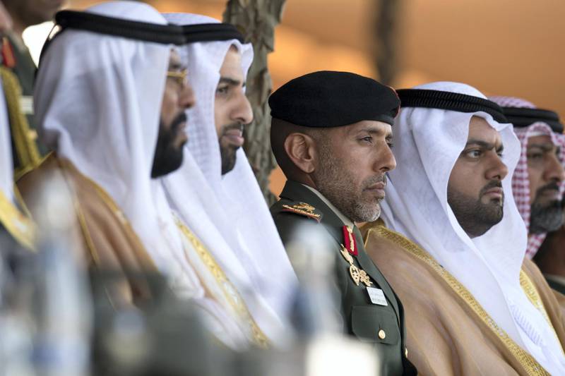 ZAYED MILITARY CITY, ABU DHABI, UNITED ARAB EMIRATES - November 28, 2017: HH Sheikh Mohamed bin Hamad Al Sharqi, Crown Prince of Fujairah (R), HH Major General Pilot Sheikh Ahmed bin Tahnoon bin Mohamed Al Nahyan, Chairman of the National and Reserve Service Authority (2nd R) and HH Sheikh Mohamed bin Saud bin Saqr Al Qasimi, Crown Prince and Deputy Ruler of Ras Al Khaimah (3rd R), attend the graduation ceremony of the 8th cohort of National Service recruits and the 6th cohort of National Service volunteers at Zayed Military City. 

( Hamad Al Mansouri for the Crown Prince Court - Abu Dhabi )
---