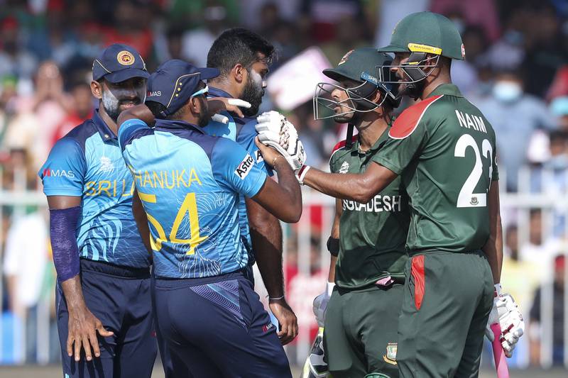 Bangladesh's Liton Das, second right, has altercation with Sri Lankan bowler Lahiru Kumara after he was dismissed during their T20 World Cup match in Sharjah on Sunday, October 24, 2021. AP