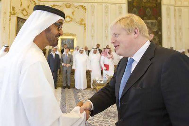 Sheikh Mohammed bin Zayed, Crown Prince of Abu Dhabi and Deputy Supreme Commander of the Armed Forces, receives Boris Johnson, the mayor of London, in the capital yesterday. Courtesy Wam