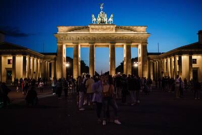 Brandenburg Gate, Germany's most recognisable landmark, is lit up at night ... but not for much longer, as its lights are set to go out each night. EPA
