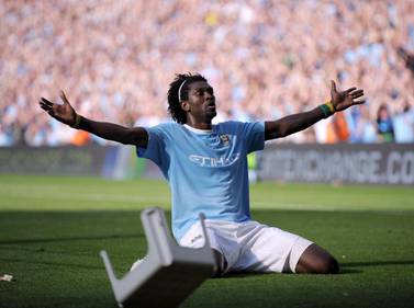 MANCHESTER, ENGLAND - SEPTEMBER 12:  Emmanuel Adebayor of Manchester City celebrates in front of the Arsenal fans after scoring during the Barclays Premier League match between Manchester City and Arsenal at the City of Manchester Stadium on September 12, 2009 in Manchester, England.  (Photo by Shaun Botterill/Getty Images)