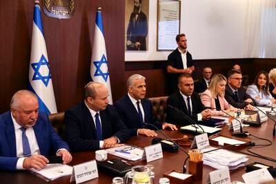 Israeli Prime Minister Yair Lapid, centre, at a special Cabinet meeting in Jerusalem to approve the deal. EPA