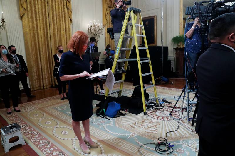 Ms Psaki at the White House as US President Joe Biden delivers remarks on the crisis in Afghanistan. Reuters