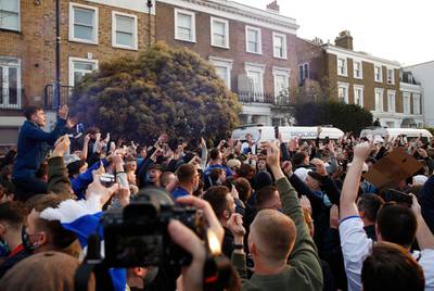 Chelsea fans protesting against the planned European Super League. Reuters